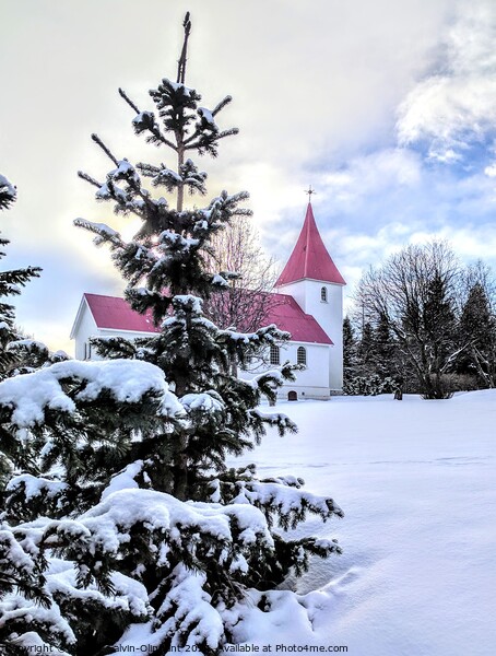 Iceland church and trees in snow  Picture Board by Robert Galvin-Oliphant