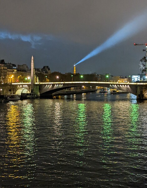 Evening Eiffel tower spotlight  Picture Board by Robert Galvin-Oliphant