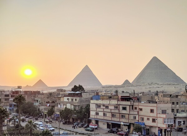 Setting sun at the pyramids of Giza Picture Board by Robert Galvin-Oliphant