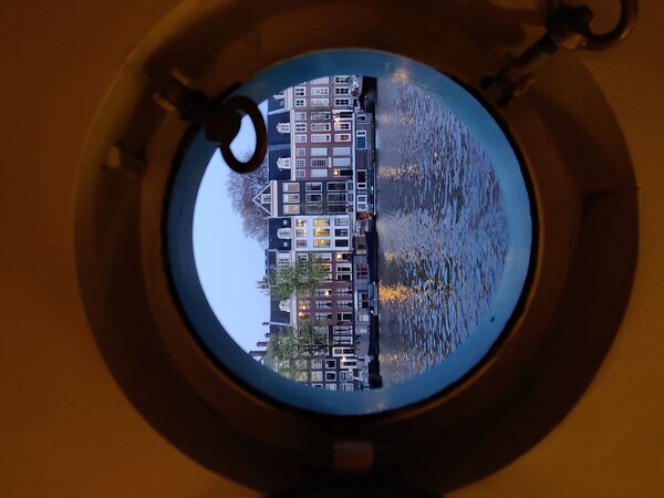  Amsterdam through little window  Picture Board by Vesna Sipec
