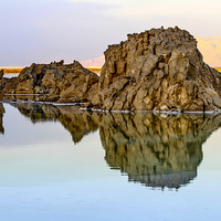 Buy canvas prints of Rocks reflect in the still water by PhotoStock Israel