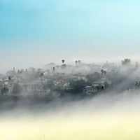 Buy canvas prints of mountainous rural village in mist by PhotoStock Israel