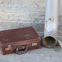Buy canvas prints of Old cardboard suitcase in the street by PhotoStock Israel