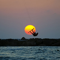 Buy canvas prints of Kite surfing at sunset by PhotoStock Israel
