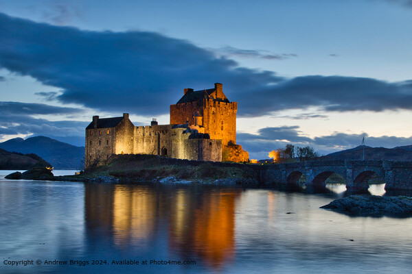 Eilean Donan Castle night shot in the Highlands of Scotland Picture Board by Andrew Briggs
