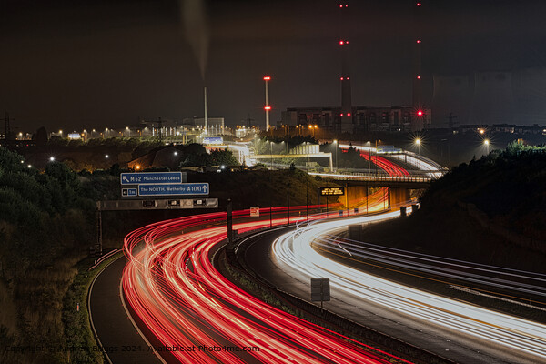 Ferrybridge light trails on the A1M in the north of England Picture Board by Andrew Briggs