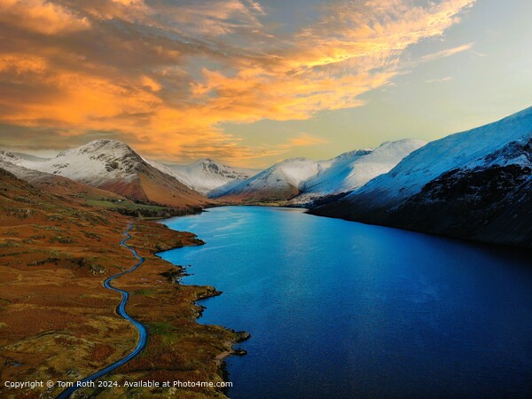 An aerial photograph of snow capped Wastwater Lake at sunset Picture Board by Tom Roth