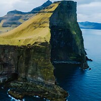 Serene Water, Rugged Cliffs, Reflections