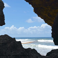 Dramatic seascape with cliff and ocean waves.