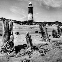 Buy canvas prints of Spurn Point Lighthouse and Groynes by Sarah Couzens