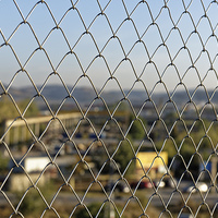 Buy canvas prints of Wire fence to protect the industrial landscape by Adrian Bud