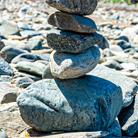 Buy canvas prints of Beach Pebble Tower by James Lavott