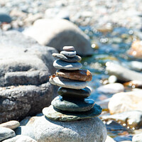 Buy canvas prints of Pebbles Tower And Stream by James Lavott