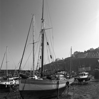 Buy canvas prints of Mevagissey Trawlers At Rest by James Lavott