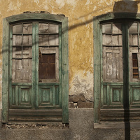 Buy canvas prints of Decaying Green Window Frames by James Lavott