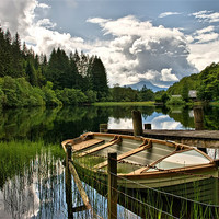 Buy canvas prints of Dinghy on Loch Ard Scotland by Jacqi Elmslie