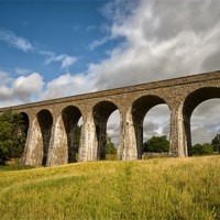 Buy canvas prints of Railway Viaduct at Tomatin by Jacqi Elmslie