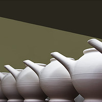 Buy canvas prints of Teapots In a Row by Jacqi Elmslie