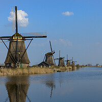 Buy canvas prints of Kinderdijk Windmills by James Buckle