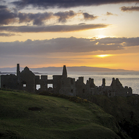Buy canvas prints of Sunset over Dunluce Castle by David McFarland