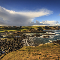 Buy canvas prints of Dunseverick in the sunshine by David McFarland