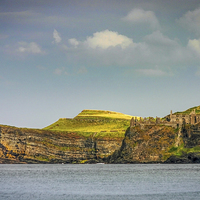 Buy canvas prints of Dunluce Castle on the edge by David McFarland