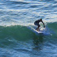 Buy canvas prints of Surfer Chapple Porth Cornwall by Brian Roscorla