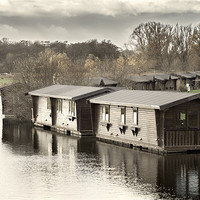 Buy canvas prints of Wooden Boathouses by Stephen Mole