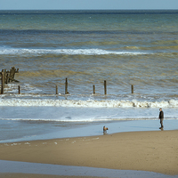 Buy canvas prints of Paddling on Happisburgh Beach by Stephen Mole
