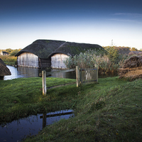 Buy canvas prints of Thatched Boathouses by Stephen Mole