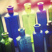 Buy canvas prints of  Antique Glass Bottles by James Rowland