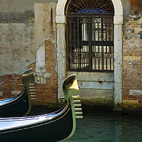 Buy canvas prints of Gondola and arched doorway by James Rowland