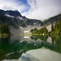 Buy canvas prints of Snow LAke Reflected by Mike Dawson