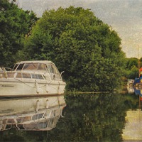 Buy canvas prints of Boats on the Broads by Julie Coe