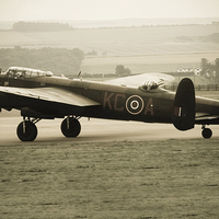 Buy canvas prints of Lancaster Bomber by Andrew Beveridge