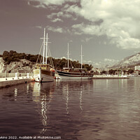 Buy canvas prints of Makarska boats reflected by Rob Hawkins