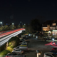 Buy canvas prints of Light trails at Wooden bridge by Rob Hawkins