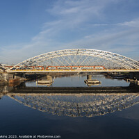 Buy canvas prints of Krakow railway bridge reflections by Rob Hawkins