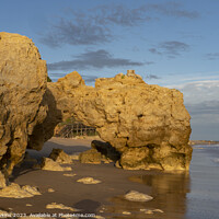Buy canvas prints of Oura Beach Arch  by Rob Hawkins