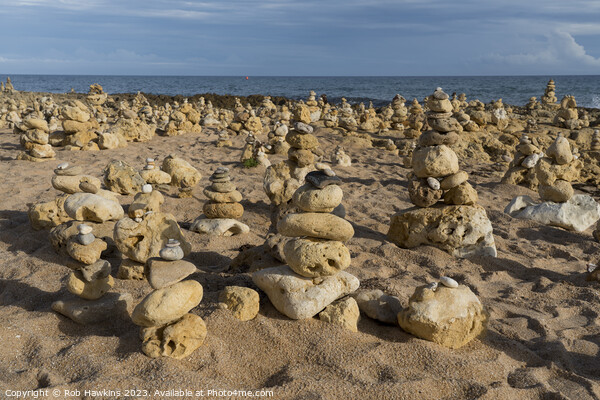 Oura beach stone stacks Picture Board by Rob Hawkins
