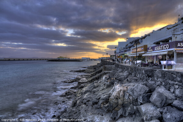 Playa Blanca promenade twilight Picture Board by Rob Hawkins