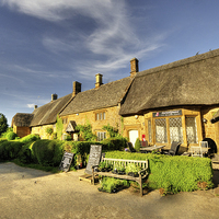 Buy canvas prints of Thatched Cottages at Great Tew by Rob Hawkins