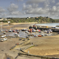 Buy canvas prints of The harbour at Tenby by Rob Hawkins