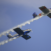 Buy canvas prints of Stunt Planes by Rob Hawkins