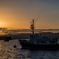 Buy canvas prints of  Oban Boat Sunset  by Rob Hawkins