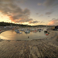 Buy canvas prints of Lyme Regis Harbour  by Rob Hawkins