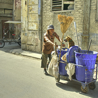 Buy canvas prints of  The Street Cleaner and his dog  by Rob Hawkins