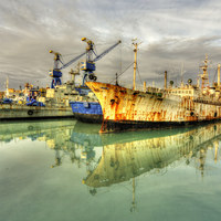 Buy canvas prints of Paola Dock Reflections  by Rob Hawkins