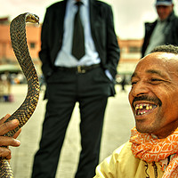 Buy canvas prints of The Snake Charmer  by Rob Hawkins