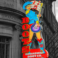 Buy canvas prints of Broadway Boots  by Rob Hawkins
